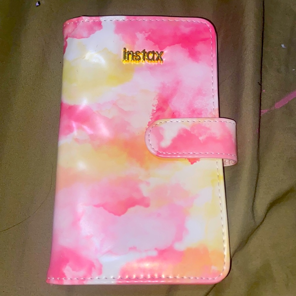 Instax Polaroid photo album.
